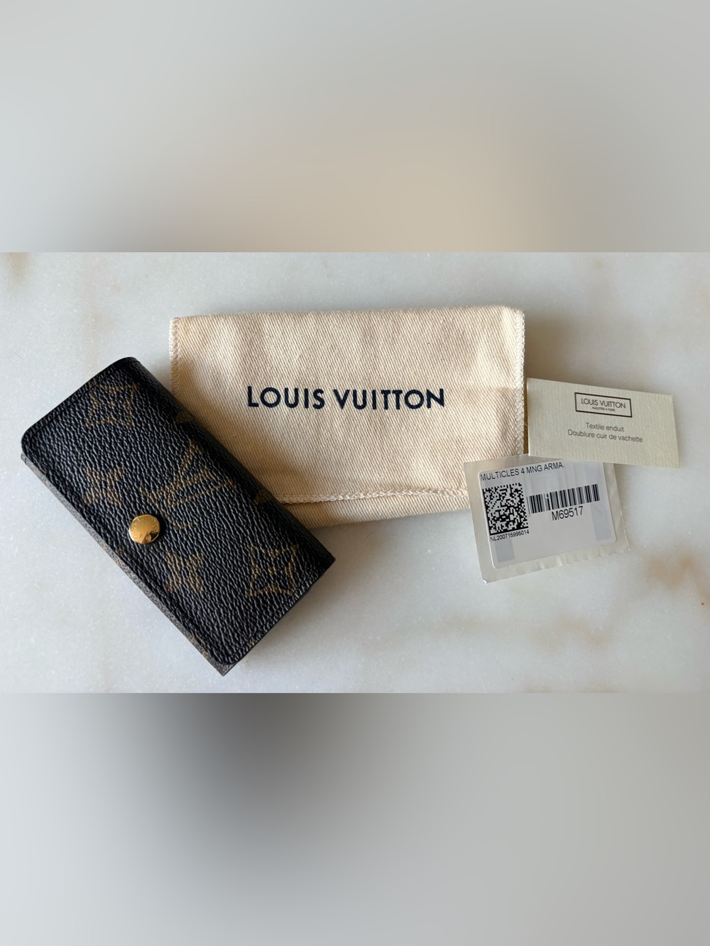 Louis Vuitton Monogram 4-ring key Holder - New condition